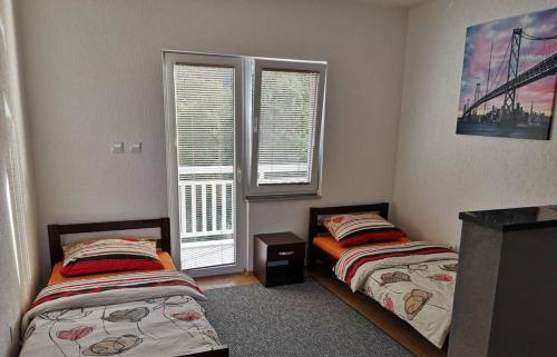 Ein Bett oder Betten in einem Zimmer der Unterkunft Villa Bico