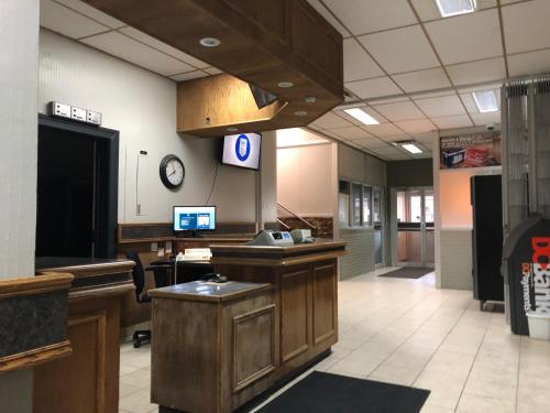 a waiting room with acision at Royal Hotel in Flin Flon