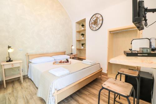 Postel nebo postele na pokoji v ubytování Bella 'Mbriana