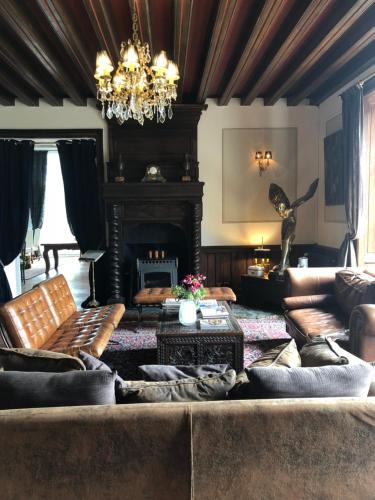 Ein Sitzbereich in der Unterkunft Château d'Ardrée