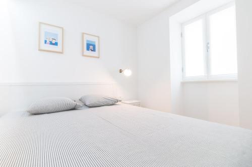 Seaview Apartments Baskaにあるベッド