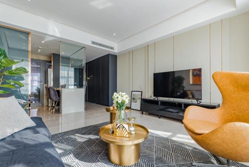 TV a/nebo společenská místnost v ubytování Tianfu IN Service Apartement