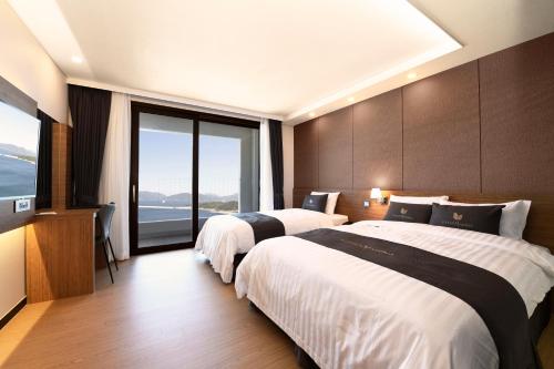 Кровать или кровати в номере Utop Marina Hotel & Resort