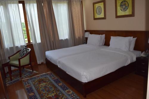 Postel nebo postele na pokoji v ubytování Kisa Villa