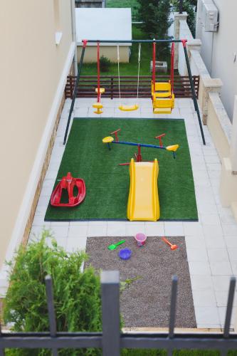 Zona de juegos infantil en Villas Promis