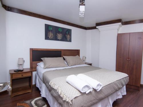 Lucia Agustina Hotel Boutiqueにあるベッド