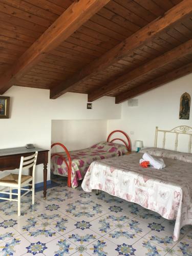 Katil atau katil-katil dalam bilik di Balconcino degli innamorati Tropea