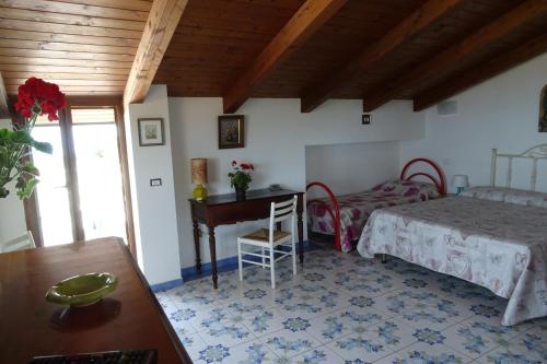 Katil atau katil-katil dalam bilik di Balconcino degli innamorati Tropea