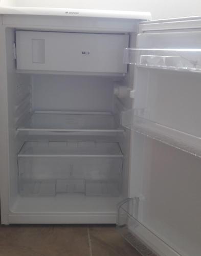 an empty white refrigerator with its door open at Rota Hotel in Dalyan