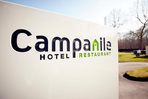 a sign for the canadian hotel i rebuild restaurant at Campanile Hotel Compiegne in Compiègne