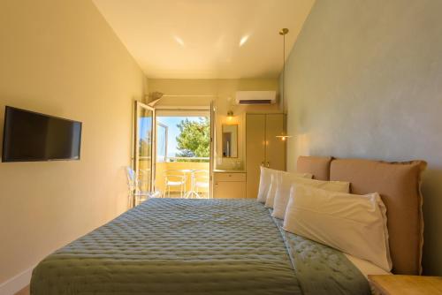 Posteľ alebo postele v izbe v ubytovaní Panas Hotel
