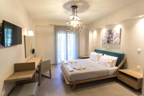 Postel nebo postele na pokoji v ubytování Moonline Maisonettes & Apartments