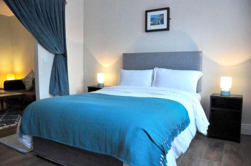 מיטה או מיטות בחדר ב-Killilagh House Accommodation