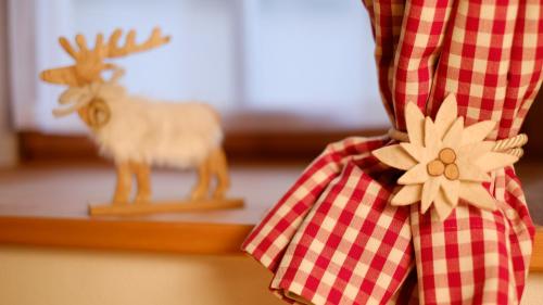 a figurine of a reindeer on a table at Residence Tamperhof in San Candido