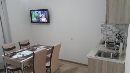 Majoituspaikan Deme House keittiö tai keittotila