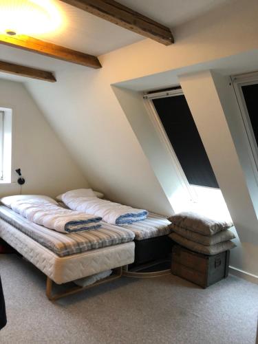 Posteľ alebo postele v izbe v ubytovaní Stort hus nær Rømø