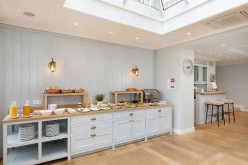 a kitchen with a counter with food on it at Villa Sedina in Rewal