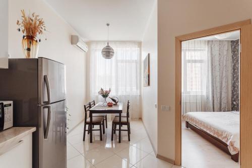 Posteľ alebo postele v izbe v ubytovaní Siesta Arkadia Apartament