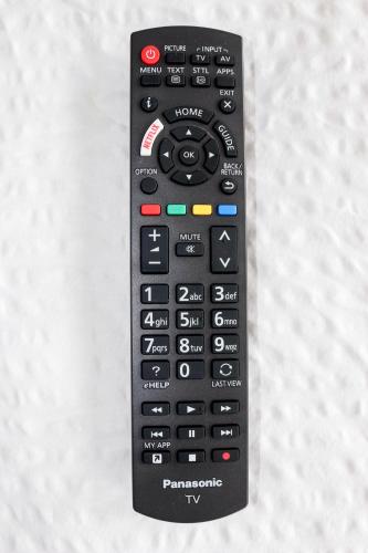 a remote control sitting on top of a table at Das Fischer Boardinghouse BW in Bad Wörishofen