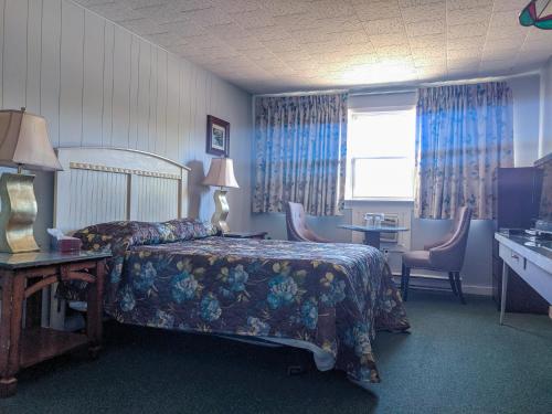 Cama o camas de una habitación en Skyline Motel