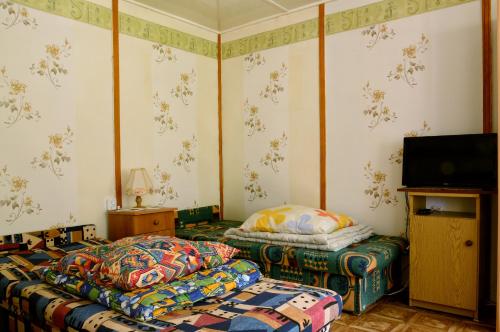 Giường trong phòng chung tại Domki letniskowe U GOSI
