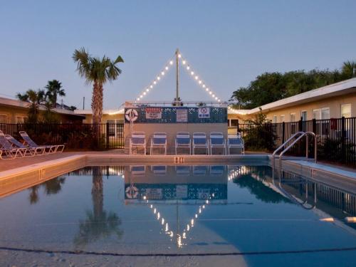a swimming pool at a hotel with a resort at The Catalina in Panama City Beach