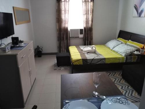 Μια τηλεόραση ή/και κέντρο ψυχαγωγίας στο Mak'z Condo Place
