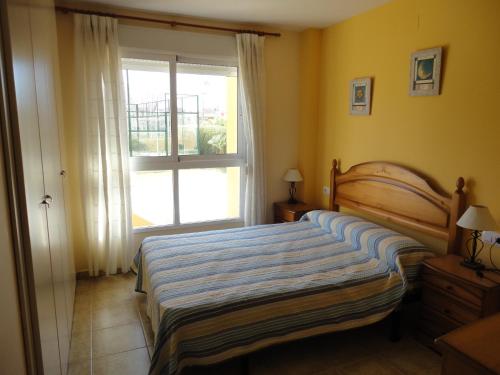 Postel nebo postele na pokoji v ubytování Urbanización Sueños de Denia II bajo