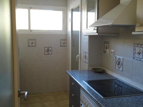 Kuchyň nebo kuchyňský kout v ubytování Urbanización Sueños de Denia II bajo