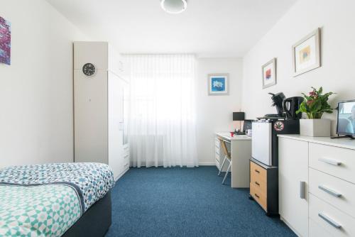 Postel nebo postele na pokoji v ubytování Enschede