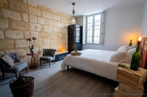 Postel nebo postele na pokoji v ubytování La Parenthèse des Capucins - Maison d'hôtes Bordeaux