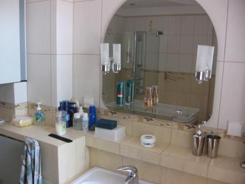 a bathroom with a sink and a mirror at Marco in Świętoszówka