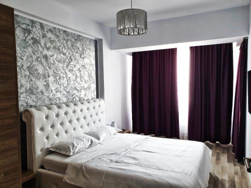 Llit o llits en una habitació de Arianna Residence Summerland