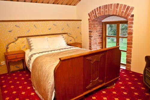 Кровать или кровати в номере Linnumaja Guesthouse