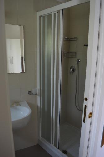 a bathroom with a shower and a sink at Hotel Emperador in Lido di Jesolo