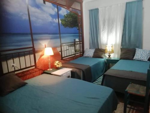 Cama o camas de una habitación en Can Pau Guesthouse