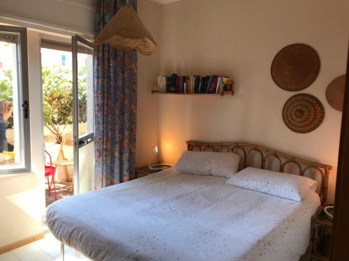 En eller flere senge i et værelse på La Casa di Gavino