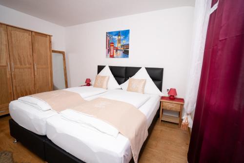 Postel nebo postele na pokoji v ubytování Hotel Bären