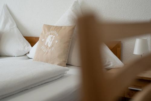 Postel nebo postele na pokoji v ubytování Hotel Bären