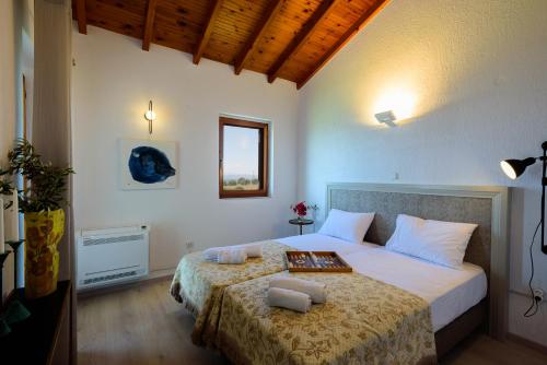 Ένα ή περισσότερα κρεβάτια σε δωμάτιο στο Finisia House