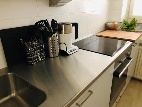Cuisine ou kitchenette dans l'établissement Scandinavian Sweet home 18 Heart of City