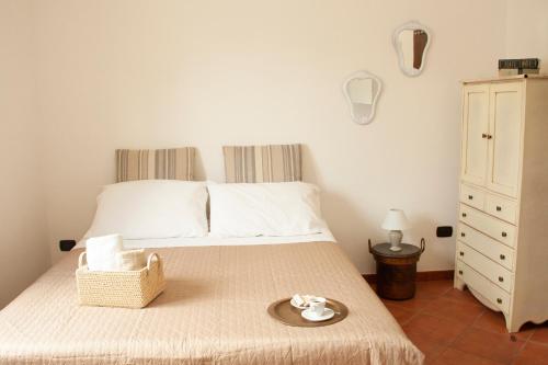 En eller flere senge i et værelse på Villa lilly