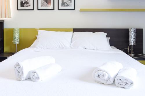 Alessandra Apartmentsにあるベッド