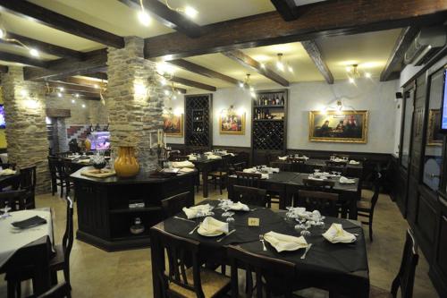 Un restaurant u otro lugar para comer en Corte Coronisio B&b