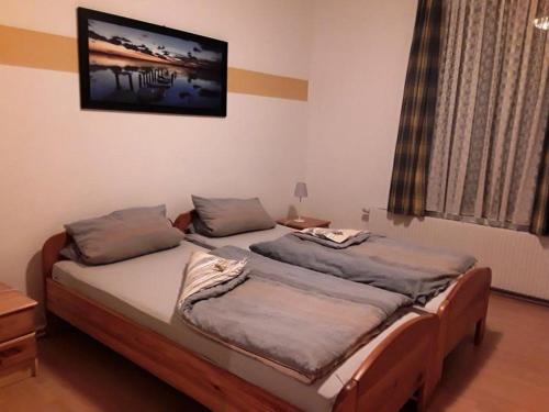 Кровать или кровати в номере Zander