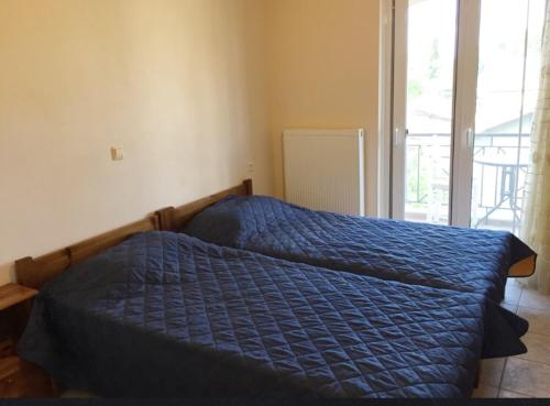 Postel nebo postele na pokoji v ubytování Nonika’s house 1