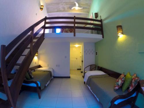 Cama o camas de una habitación en Pousada Tatuapara