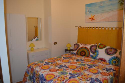Postel nebo postele na pokoji v ubytování Casa Le Sorelle
