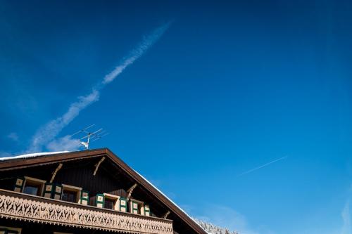 a building with a blue sky in the background at Nant Morzine in Morzine