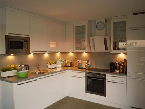 Η κουζίνα ή μικρή κουζίνα στο Schleikieker Maisonette